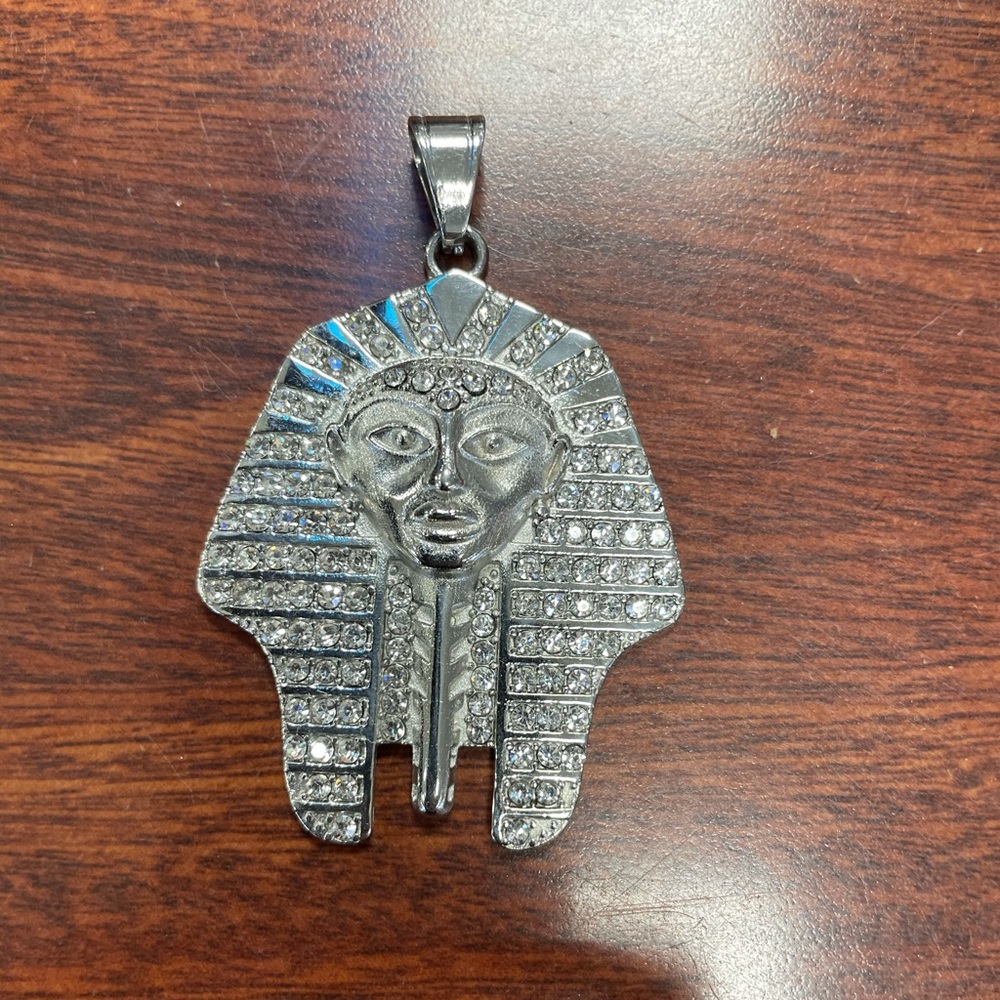 Egyptian head pendant with stones